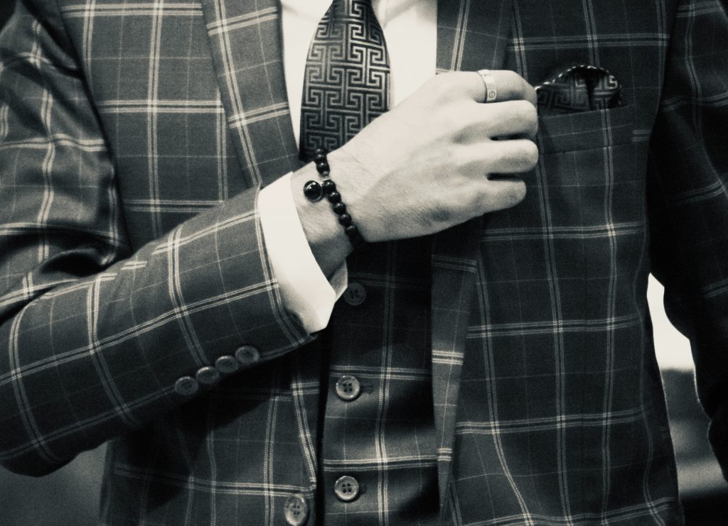 A man wearing a windowpane suit, often seen at Cheltenham.