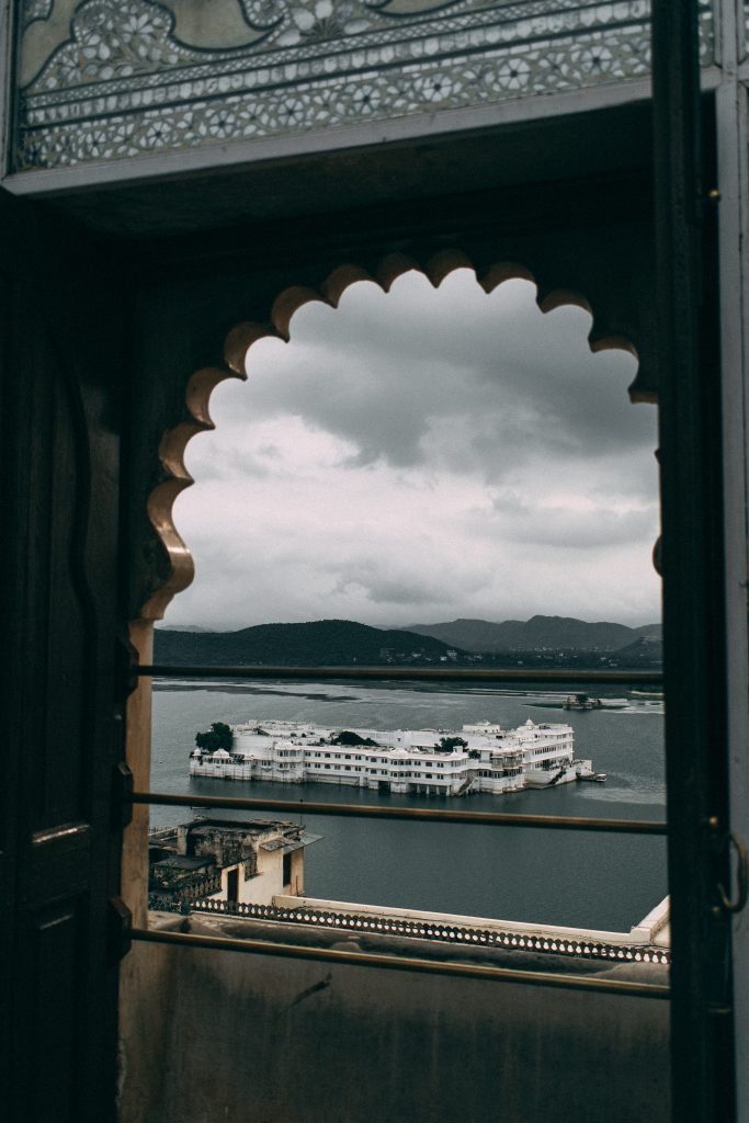 A building in Udaipur seen through a keyhole arch.