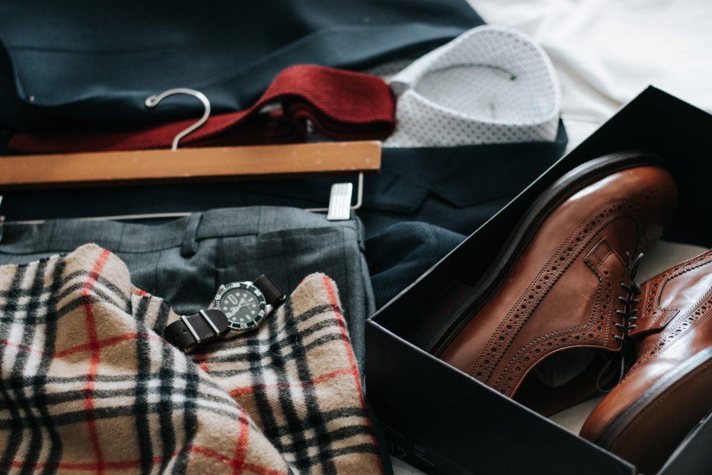Brown shoes, trousers suit and a watch. Crafting a unique outfit is part of the Cheltenham Festival.