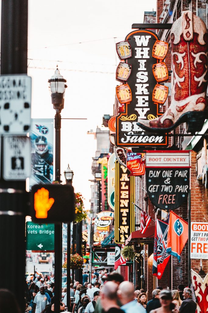 Nashville's many signs and flags on a main street.