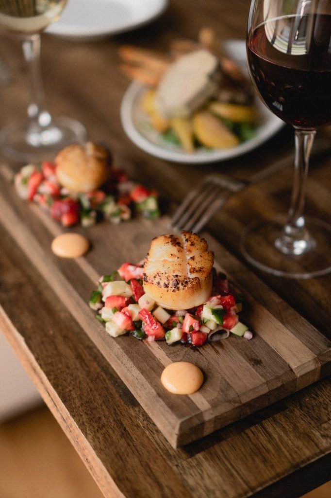 Melbourne's Food and Wine Festival is all about wine-ing and dining. Wine with a seafood dish.
