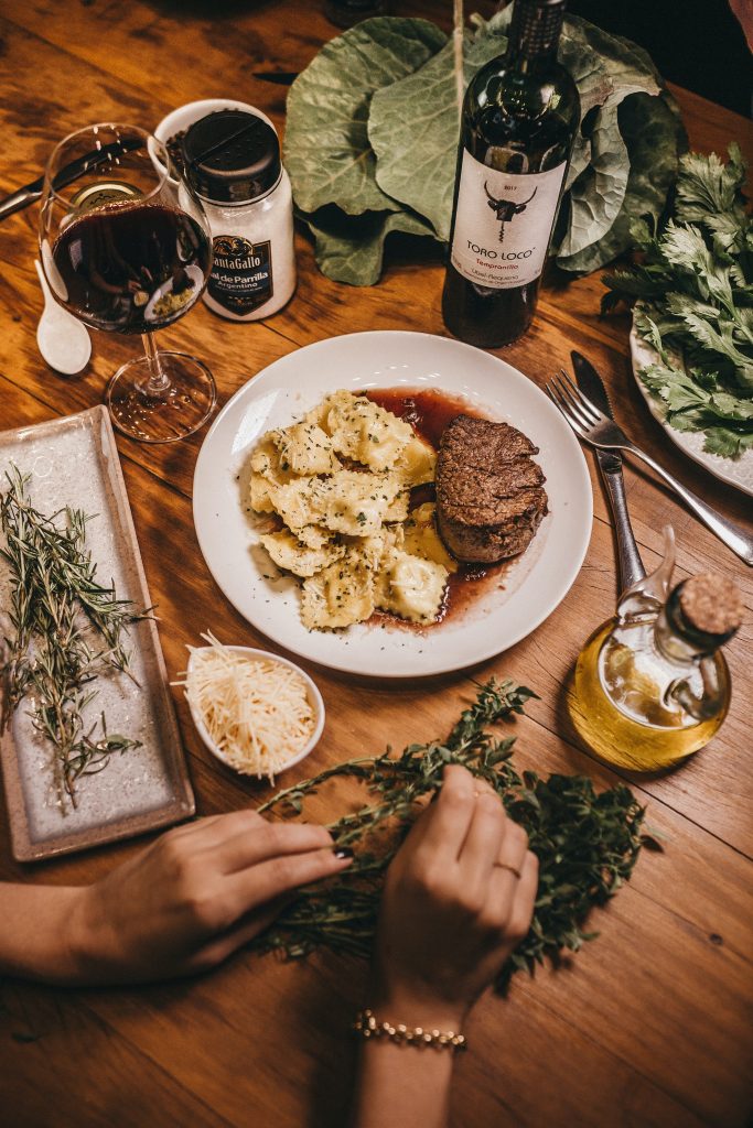 A red wine paired with a beef dish.