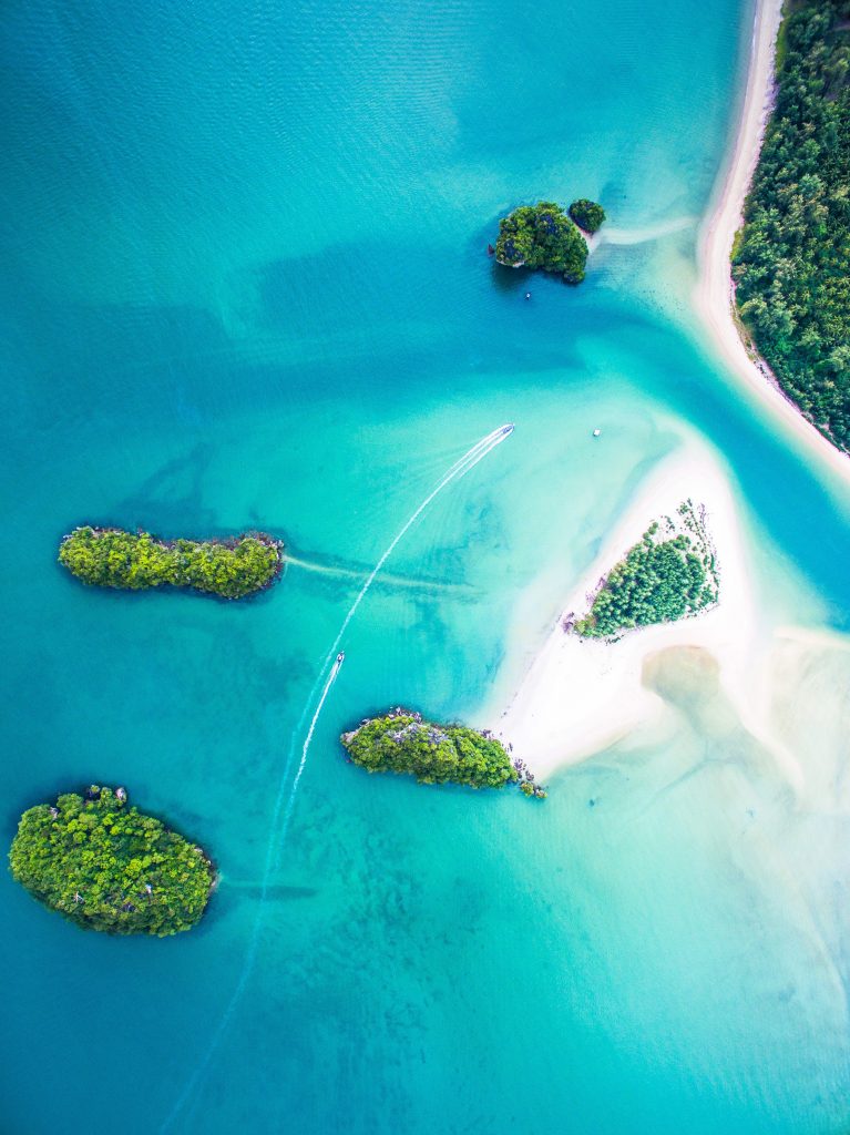 A pristine beach from the air on Thailand's south coast.