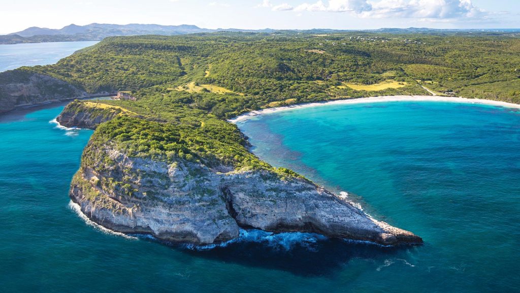 We take a trip to Antigua – the Caribbean island that enraptured Princess Diana, Jackie O, Hemminingway and, most recently, Harry and Megan.