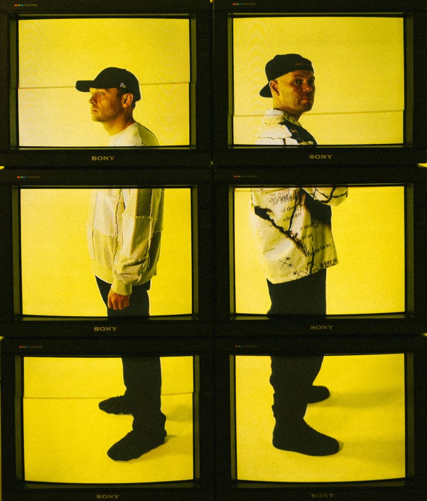 Solardo, both of the duo shown on three tv screens each next to each other.