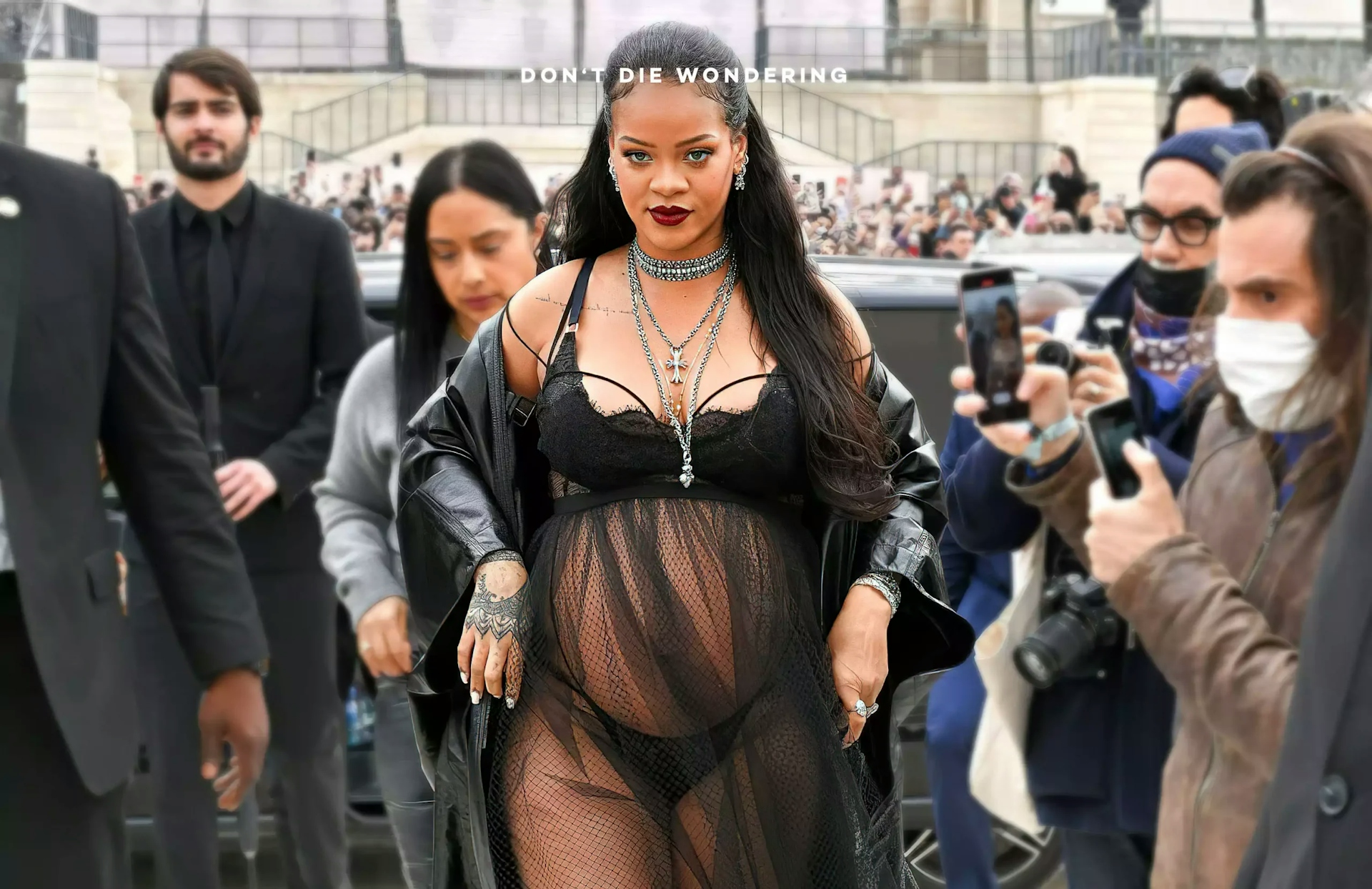 The Best Maternity Look Ever? Rihanna Wears A Sheer Black Dress To The Dior Paris Fashion Week Show