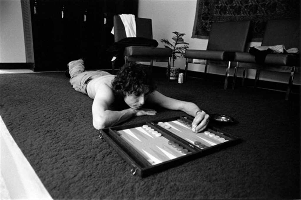 Bob Dylan sets up the board whilst taking break between shows