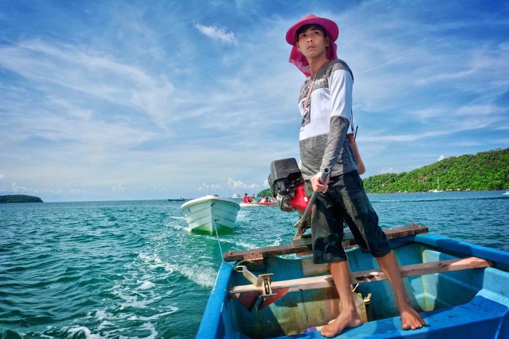 A young man on a boat.