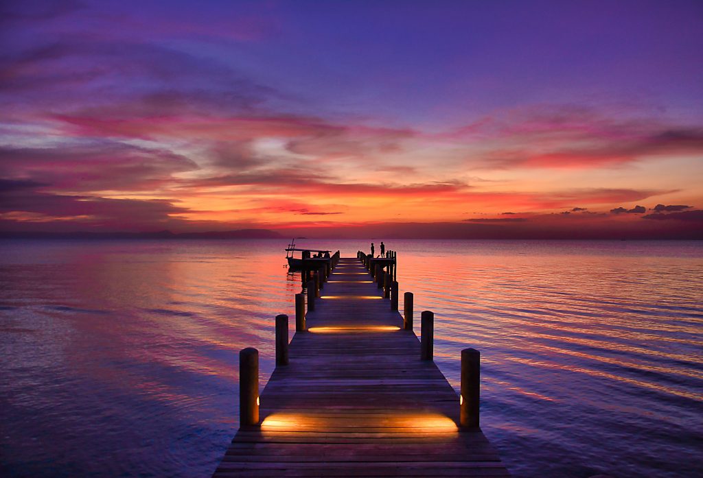 Sunset in Kep, Southern Cambodia seen from a pier.