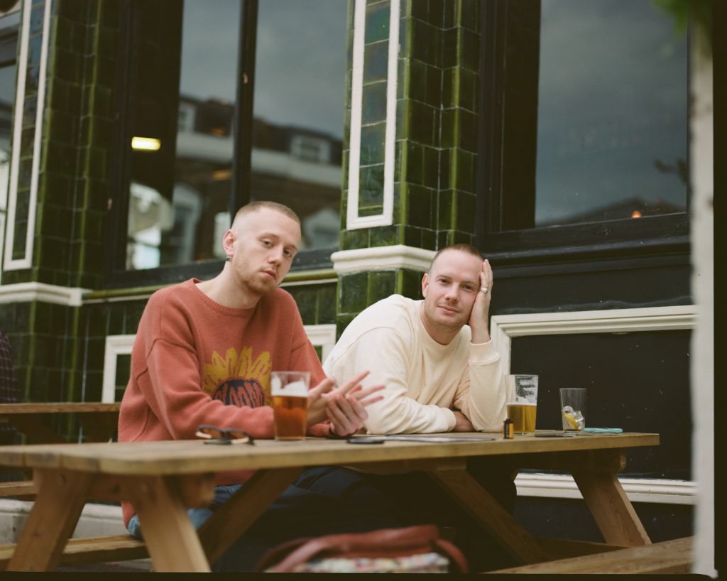Miller Blue and Laurence Guy on the table
